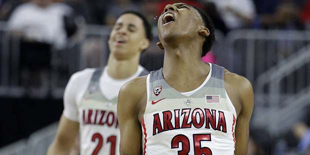 Arizona's Allonzo Trier reacts during the second half of the team's NCAA college basketball game ag...