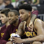 Iona's Rickey McGill center, and Jordan Washington, right, watch the closing moments of their 93-77 loss to Oregon of a first-round game in the men's NCAA college basketball tournament Sacramento, Calif., Friday, March 17, 2017. (AP Photo/Rich Pedroncelli)