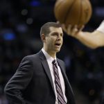 Boston Celtics coach Brad Stevens speaks to a referee during the first quarter of the team's NBA basketball game against the Phoenix Suns, Friday, March 24, 2017, in Boston. (AP Photo/Elise Amendola)