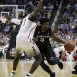 Xavier guard Quentin Goodin (3) is defended by Arizona guard Rawle Alkins (1) during the second half of an NCAA Tournament college basketball regional semifinal game Thursday, March 23, 2017, in San Jose, Calif. (AP Photo/Ben Margot)