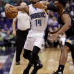 Orlando Magic guard D.J. Augustin (14) is pressured by Phoenix Suns guard Ronnie Price during the first half of an NBA basketball game, Friday, March 17, 2017, in Phoenix. (AP Photo/Matt York)