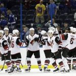The Arizona Coyotes celebrate their 5-3 win over the Tampa Bay Lightning in an NHL hockey game Tuesday, March 21, 2017, in Tampa, Fla. (AP Photo/Chris O'Meara)
