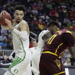 Oregon's Dillon Brooks, left, grabs a rebound over Arizona State's Shannon Evans II, right, during the second half of an NCAA college basketball game in the quarterfinals of the Pac-12 men's tournament Thursday, March 9, 2017, in Las Vegas. Oregon won 80-57. (AP Photo/John Locher)