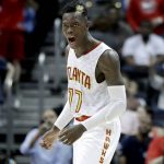 Atlanta Hawks' Dennis Schroder, of Germany, reacts after hitting a three-point basket in the fourth quarter of an NBA basketball game against the Phoenix Suns in Atlanta, Tuesday, March 28, 2017. Atlanta won 95-91. (AP Photo/David Goldman)