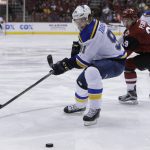 St. Louis Blues right wing Vladimir Tarasenko (91) shields Arizona Coyotes left wing Brendan Perlini from the puck in the first period during an NHL hockey game, Wednesday, March 29, 2017, in Glendale, Ariz. (AP Photo/Rick Scuteri)