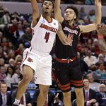 Louisville guard Quentin Snider (4) shoots in front of Jacksonville State guard Erik Durham (15) during the second half of a first-round game in the men's NCAA college basketball tournament in Indianapolis, Friday, March 17, 2017. Louisville defeated Jacksonville State 78-63. (AP Photo/Michael Conroy)