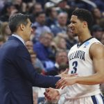 Villanova coach Jay Wright and guard Josh Hart talk during the second half of a second-round game against Wisconsin in the NCAA men's college basketball tournament, Saturday, March 18, 2017, in Buffalo, N.Y. Wisconsin won p65-62. (AP Photo/Bill Wippert)
