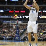Dallas Mavericks forward Dirk Nowitzki (41) makes a two-point shot against the Phoenix Suns during the first half of an NBA basketball game in Dallas, Saturday, March 11, 2017. (AP Photo/Michael Ainsworth)