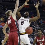 Stanford's Michael Humphrey, left, fouls Arizona State's Obinna Oleka during the second half of an NCAA college basketball game in the first round of the Pac-12 men's tournament Wednesday, March 8, 2017, in Las Vegas. Arizona State won 98-88.(AP Photo/John Locher)
