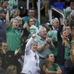 North Dakota fans cheer during the first half of the team's first-round against Arizona in the NCAA men's college basketball tournament Thursday, March 16, 2017, in Salt Lake City. (AP Photo/George Frey)
