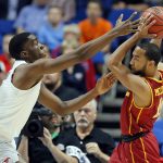 SMU's Shake Milton, left, defends as USC's Jordan McLaughlin prepares to make a pass in the first half of a first-round game in the men's NCAA college basketball tournament in Tulsa, Okla., Friday March 17, 2017. (AP Photo/Tony Gutierrez)