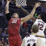 Stanford's Reid Travis (22) shoots over Arizona State's Andre Adams during the first half of an NCAA college basketball game in the first round of the Pac-12 men's tournament Wednesday, March 8, 2017, in Las Vegas. (AP Photo/John Locher)