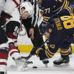 Buffalo Sabres Ryan O'Reilly (90) and Arizona Coyotes Josh Jooris (86) battle for the puck during the second period of an NHL hockey game, Thursday, March. 2, 2017, in Buffalo, N.Y. (AP Photo/Jeffrey T. Barnes)