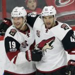 Arizona Coyotes' Shane Doan (19) and Jordan Martinook (48) celebrate Martinook's winning goal during the third period of an NHL hockey game against the Carolina Hurricanes in Raleigh, N.C., Friday, March 3, 2017. (AP Photo/Gerry Broome)