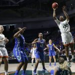 Miami's Keyona Hayes (20) shoots the winning basket during the second half of a first-round game against Florida Gulf Coast in the NCAA women's college basketball tournament, Saturday, March 18, 2017, in Coral Gables, Fla. (AP Photo/Lynne Sladky)