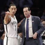 Brooklyn Nets' Jeremy Lin, left, talks to coach Kenny Atkinson during the first half of the team's NBA basketball game against the Phoenix Suns on Thursday, March 23, 2017, in New York. (AP Photo/Frank Franklin II)