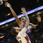 Phoenix Suns' Leandro Barbosa, right, shoots as Miami Heat's Tyler Johnson (8) defends during the first half of an NBA basketball game Tuesday, March 21, 2017, in Miami. (AP Photo/Lynne Sladky)