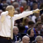 Michigan head coach John Beilein gestures from the bench as his team played Louisville during the second half of a second-round game in the men's NCAA college basketball tournament in Indianapolis, Sunday, March 19, 2017. Michigan defeated Louisville 73-69. (AP Photo/Michael Conroy)