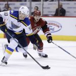 St. Louis Blues right wing Scottie Upshall (10) skates away from Arizona Coyotes defenseman Anthony DeAngelo in the first period during an NHL hockey game, Wednesday, March 29, 2017, in Glendale, Ariz. (AP Photo/Rick Scuteri)