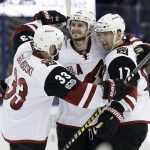 Arizona Coyotes right wing Radim Vrbata (17) celebrates his goal against the Tampa Bay Lightning with defenseman Oliver Ekman-Larsson (23) and defenseman Alex Goligoski (33) during the third period of an NHL hockey game Tuesday, March 21, 2017, in Tampa, Fla. The Coyotes won the game 5-3. (AP Photo/Chris O'Meara)