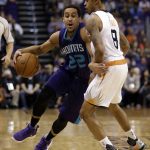 Charlotte Hornets guard Brian Roberts (22) drives on Phoenix Suns guard Tyler Ulis in the first quarter during an NBA basketball game, Thursday, March 2, 2017, in Phoenix. (AP Photo/Rick Scuteri)