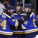 St. Louis Blues' Alex Pietrangelo, center, is congratulated by Nail Yakupov, of Russia, and Alexander Steen, right, after scoring during the second period of an NHL hockey game against the Arizona Coyotes Monday, March 27, 2017, in St. Louis. (AP Photo/Jeff Roberson)