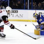 Arizona Coyotes' Josh Jooris, left, is unable to score past St. Louis Blues goalie Jake Allen during the first period of an NHL hockey game Monday, March 27, 2017, in St. Louis. (AP Photo/Jeff Roberson)