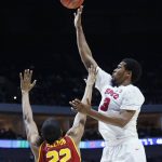 Southern Methodist guard Sterling Brown (3) shoots over Southern California guard De'Anthony Melton (22) in the second half of a first-round game in the men's NCAA college basketball tournament in Tulsa, Okla., Friday, March 17, 2017. Southern California won 66-65. (AP Photo/Sue Ogrocki)