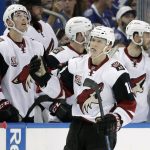 Arizona Coyotes center Christian Dvorak (18) celebrates with the bench after scoring against the Tampa Bay Lightning during the second period of an NHL hockey game Tuesday, March 21, 2017, in Tampa, Fla. (AP Photo/Chris O'Meara)