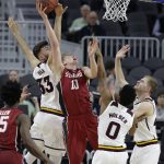 Stanford's Michael Humphrey (10) shoots over Arizona State's Ramon Vila (33) and Arizona State's Tra Holder (0) during the second half of an NCAA college basketball game in the first round of the Pac-12 men's tournament, Wednesday, March 8, 2017, in Las Vegas. Arizona State won 98-88.(AP Photo/John Locher)