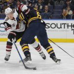 Buffalo Sabres defenseman Cody Franson (6) stops Arizona Coyotes forward Christian Dvorak (18) from entering the zone during the second period of an NHL hockey game, Thursday, March. 2, 2017, in Buffalo, N.Y. (AP Photo/Jeffrey T. Barnes)