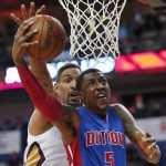 Detroit Pistons guard Kentavious Caldwell-Pope (5) goes to the basket against New Orleans Pelicans center Alexis Ajinca during the first half of an NBA basketball game in New Orleans, Wednesday, March 1, 2017. (AP Photo/Gerald Herbert)