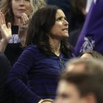 Actress Julia Louis-Dreyfus cheers for Northwestern during a first-round game of the NCAA men's college basketball tournament Thursday, March 16, 2017, in Salt Lake City. Northwestern defeated Vanderbilt 68-66. (AP Photo/George Frey)