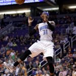 Orlando Magic forward Terrence Ross (31) dunks against the Phoenix Suns during the first half of an NBA basketball game, Friday, March 17, 2017, in Phoenix. (AP Photo/Matt York)