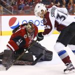 Arizona Coyotes goalie Mike Smith (41) makes a save on a shot by Colorado Avalanche center Carl Soderberg (34) during the first period of an NHL hockey game, Monday, March 13, 2017, in Glendale, Ariz. (AP Photo/Ross D. Franklin)