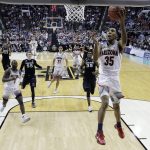 Arizona guard Allonzo Trier (35) drives to the basket against against Xavier during the first half of an NCAA Tournament college basketball regional semifinal game Thursday, March 23, 2017, in San Jose, Calif. (AP Photo/Tony Avelar)