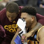 Iona's Rickey McGill, left, comforts teammate Jordan Washington after losing to Oregon 93-77 in a first-round game in the men's NCAA college basketball tournament Sacramento, Calif., Friday, March 17, 2017. (AP Photo/Rich Pedroncelli)