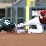 Oakland Athletics' Marcus Semien steals second as Arizona Diamondbacks' Brandon Drury reaches for the throw during the second inning of a spring training baseball game Tuesday, March 7, 2017, in Scottsdale, Ariz. (AP Photo/Darron Cummings)