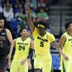 Baylor's Johnathan Motley (5) celebrates a New Mexico State turnover as Tanveer Bhullar (21), Ishmail Wainright (24) and Terry Maston (31) watch in the second half of a first-round game in the men's NCAA college basketball tournament in Tulsa, Okla., Friday March 17, 2017. (AP Photo/Tony Gutierrez)