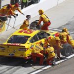 Joey Logano makes a pit stop during the NASCAR Cup Series auto race at Phoenix International Raceway, Sunday, March. 19, 2017, in Avondale, Ariz. (AP Photo/Ralph Freso)