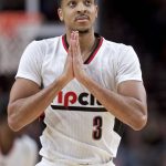 Portland Trail Blazers guard C.J. McCollum reacts after making a 3-point basket against the Oklahoma City Thunder during the first half of an NBA basketball game in Portland, Ore., Thursday, March 2, 2017. (AP Photo/Craig Mitchelldyer)