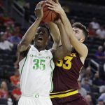 Arizona State's Ramon Vila, right, fouls Oregon's Kavell Bigby-Williams during the first half of an NCAA college basketball game in the quarterfinals of the Pac-12 men's tournament Thursday, March 9, 2017, in Las Vegas. (AP Photo/John Locher)