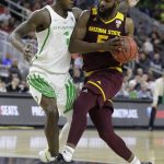 Arizona State's Obinna Oleka, right, drives into Oregon's Jordan Bell during the second half of an NCAA college basketball game in the quarterfinals of the Pac-12 men's tournament Thursday, March 9, 2017, in Las Vegas. (AP Photo/John Locher)