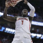 Arizona guard Rawle Alkins dunks against North Dakota during a first-round game in the NCAA men's college basketball tournament Thursday, March 16, 2017, in Salt Lake City. (AP Photo/George Frey)