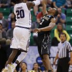 Northwestern guard Scottie Lindsey (20) grabs a rebound from Vanderbilt guard Joe Toye (2) during the first half of a first-round game in the NCAA men's college basketball tournament Thursday, March 16, 2017, in Salt Lake City. Northwestern won 68-66. (AP Photo/George Frey)