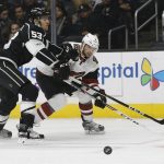 Los Angeles Kings defenseman Kevin Gravel (53) deflects a shot by Arizona Coyotes right wing Tobias Rieder (8), of Germany, during the first period of an NHL hockey game in Los Angeles, Tuesday, March 14, 2017. (AP Photo/Alex Gallardo)