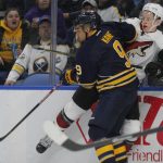 Buffalo Sabres forward Evander Kane (9) and Arizona Coyotes defenseman Connor Murphy (5) collide during the first period of an NHL hockey game, Thursday, March. 2, 2017, in Buffalo, N.Y. (AP Photo/Jeffrey T. Barnes)