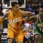 Phoenix Suns guard Tyler Ulis (8) gets pressured by Boston Celtics guard Terry Rozier in the second quarter during an NBA basketball game, Sunday, March 5, 2017, in Phoenix. (AP Photo/Rick Scuteri)