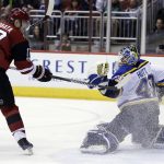 St. Louis Blues goalie Carter Hutton (40) makes the save on Arizona Coyotes right wing Radim Vrbata in the second period during an NHL hockey game, Wednesday, March 29, 2017, in Glendale, Ariz. (AP Photo/Rick Scuteri)