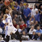 Kentucky's De'Aaron Fox heads to the basket during the second half of a second-round game against Wichita State in the men's NCAA college basketball tournament Sunday, March 19, 2017, in Indianapolis. Kentucky won 65-62. (AP Photo/Jeff Roberson)